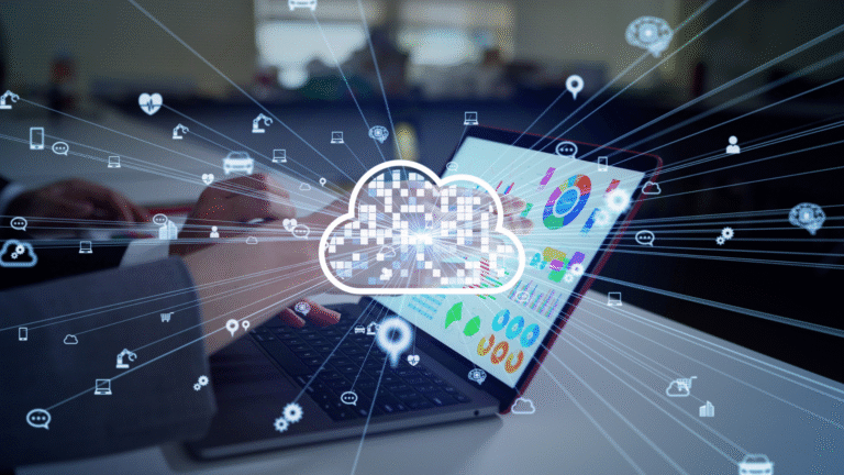 Businessperson using a laptop with digital cloud computing icons and data analytics dashboard on screen, representing SaaS technology and cloud-based software solutions.