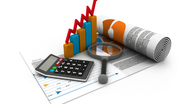 Financial charts, calculator, and magnifying glass representing analysis of profitable business ideas