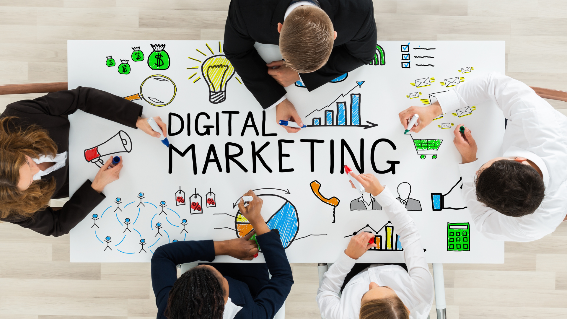 Business team brainstorming digital marketing strategies with charts, graphs, and icons on a whiteboard