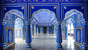 Intricate blue-painted palace interior showcasing royal architecture, one of the hidden places in India.