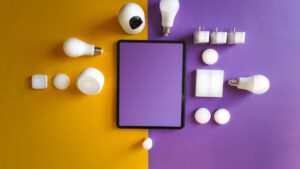 Smart Home Setup displayed with tablet dashboard, smart bulbs, plugs, sensors, and security devices arranged on a colorful background.