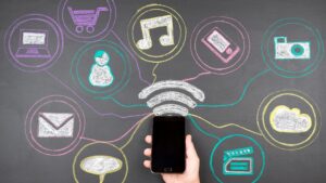 Social Media Content Calendars for Consistent Posting illustrated with a smartphone connected to multiple social media icons