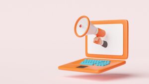 Low-Cost Advertising Options on Facebook and Instagram illustrated by a laptop with a megaphone promoting online ads