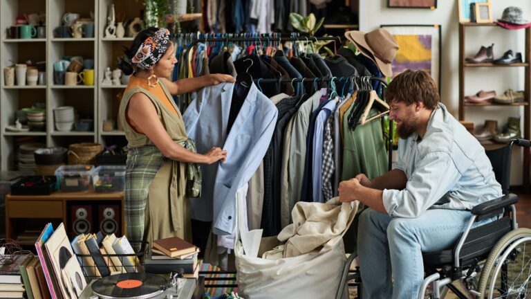 People sorting and upcycling clothes at a thrift store, showcasing thrift store flips: turning old clothes into new favorites