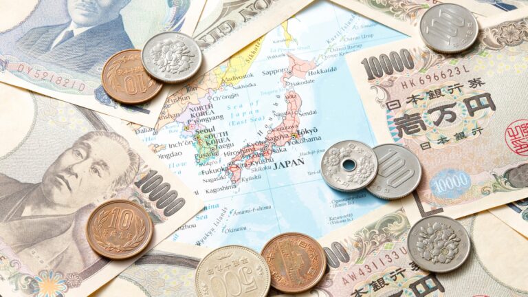 How Currency Conversion at Airports Quietly Overcharges Travelers shown with foreign cash and coins