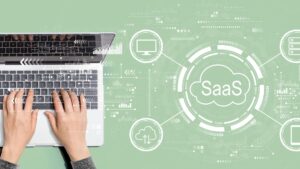 Best SaaS Tools for Startups on a Budget (2026 Stack) dashboard concept with laptop and SaaS cloud interface